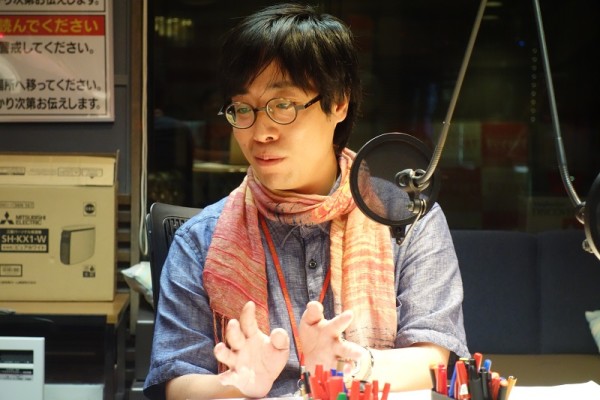 写真家の新納翔さん
